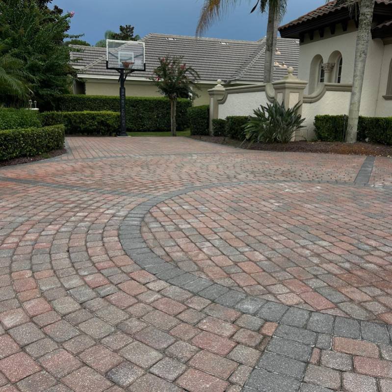 Clean paver driveway by Magic Outdoor Solutions FL